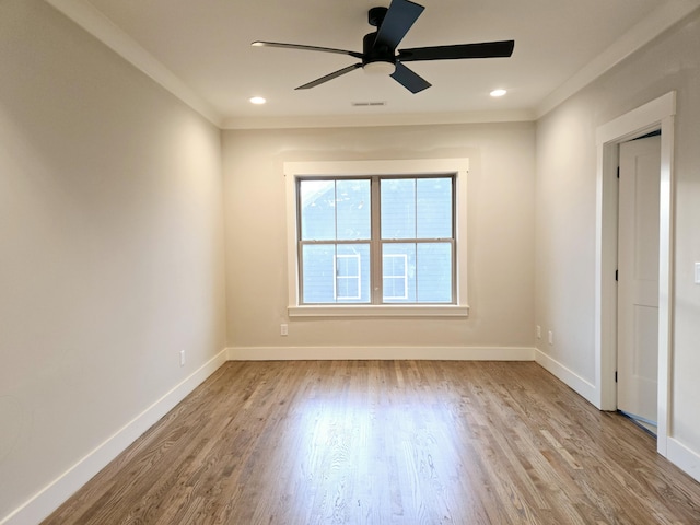 unfurnished room featuring visible vents, baseboards, a ceiling fan, wood finished floors, and recessed lighting