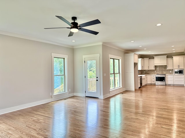 269 Quartz Dr Unit 21, Chickamauga, GA 30707 - unfurnished living room featuring ornamental molding, light wood-style floors, ceiling fan, recessed lighting, and baseboards