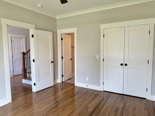 269 Quartz Dr Unit 21, Chickamauga, GA 30707 - unfurnished bedroom featuring wood finished floors, ornamental molding, baseboards, and a closet