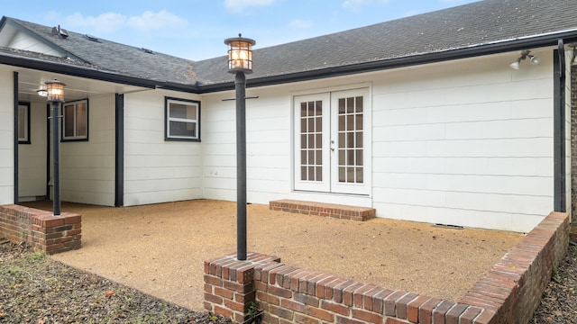 exterior space with french doors and a patio area