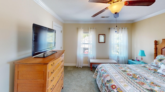 carpeted bedroom featuring ornamental molding and ceiling fan