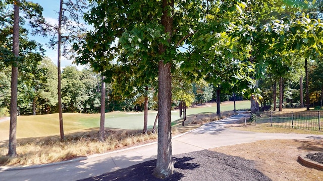 view of home's community featuring a yard