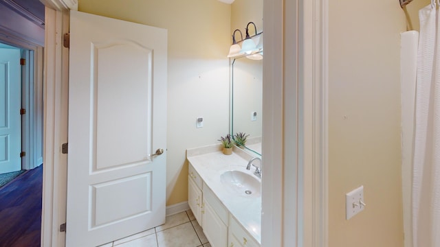 bathroom featuring vanity and tile patterned flooring