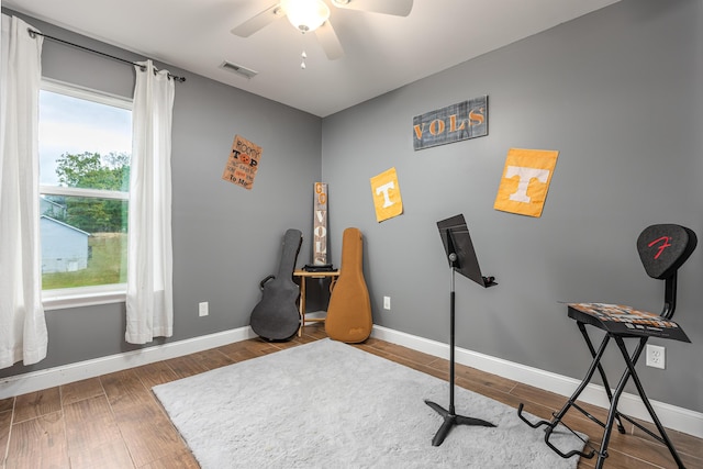 misc room featuring ceiling fan and wood-type flooring