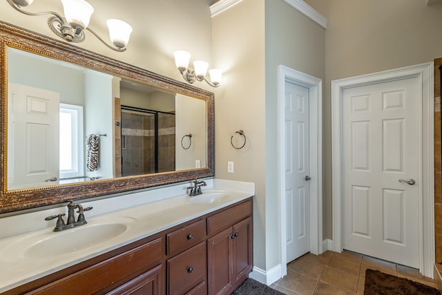 bathroom with vanity, a shower with shower door, ornamental molding, and tile patterned flooring