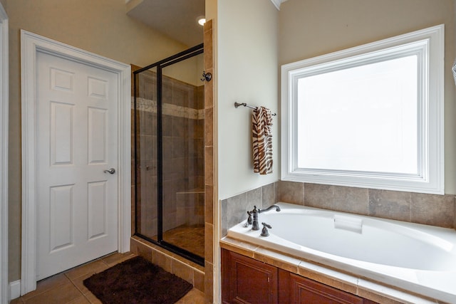 bathroom with plus walk in shower and tile patterned floors