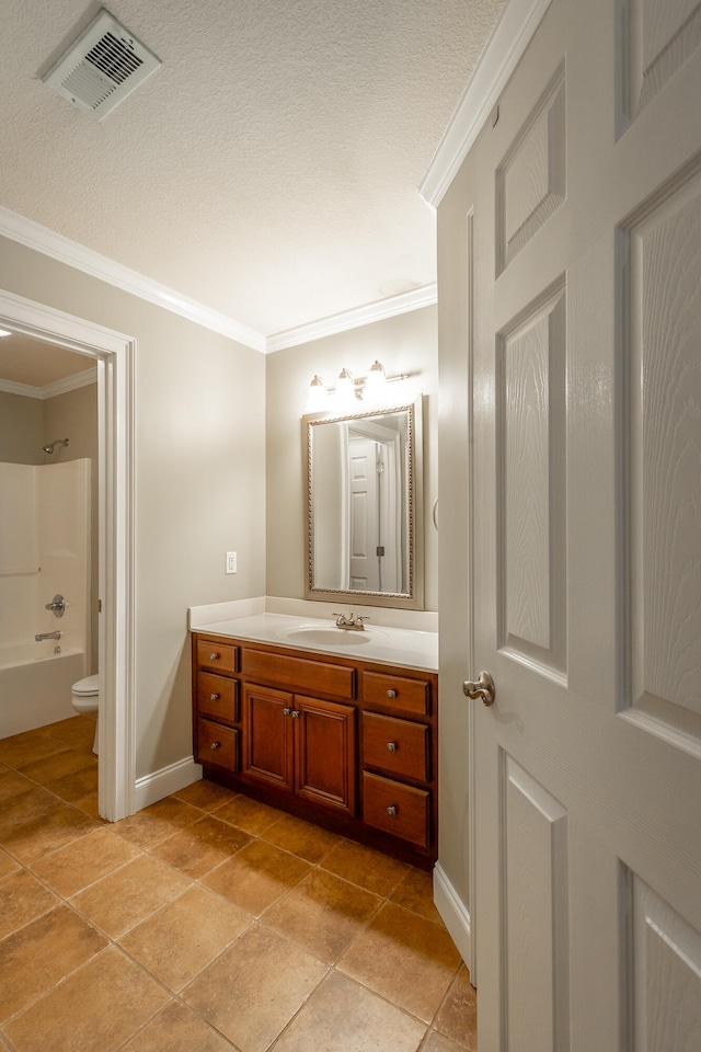 full bathroom featuring shower / washtub combination, vanity, a textured ceiling, ornamental molding, and toilet