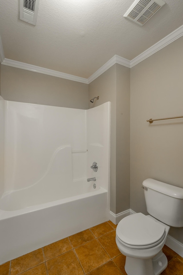 bathroom featuring ornamental molding, tile patterned flooring, tub / shower combination, and toilet