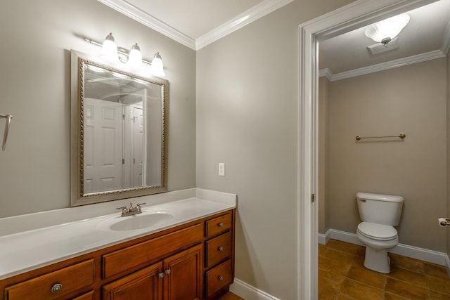 bathroom with tile patterned flooring, crown molding, vanity, and toilet