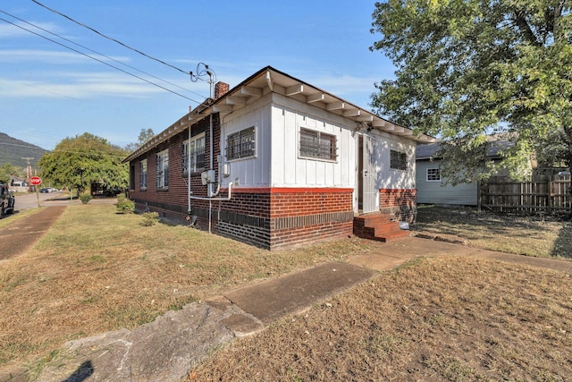 bungalow with a front lawn