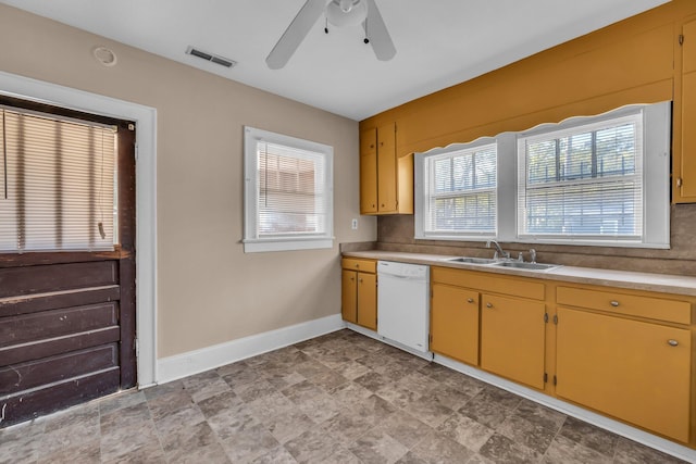 kitchen with ceiling fan, white dishwasher, and sink