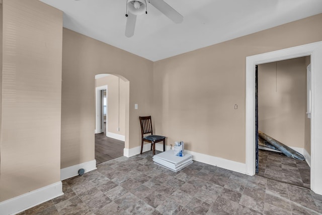 unfurnished room with ceiling fan