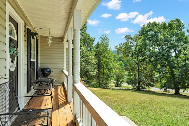 balcony featuring covered porch