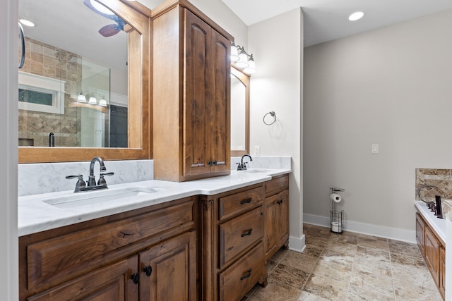 bathroom featuring vanity and a shower with door