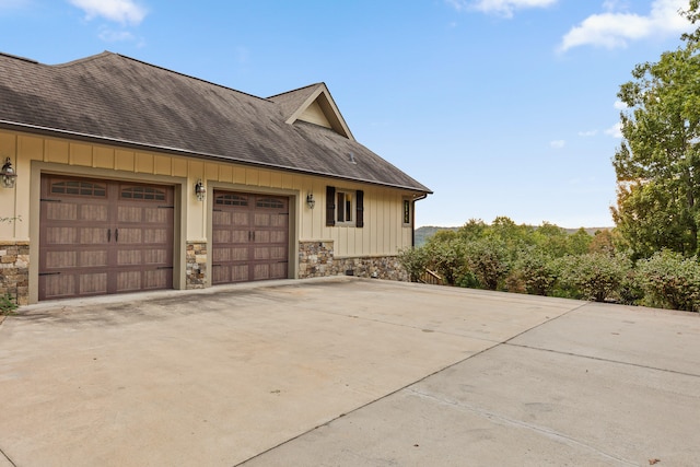 view of property exterior featuring a garage