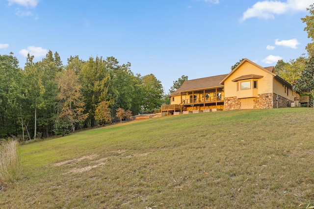 view of yard featuring a wooden deck