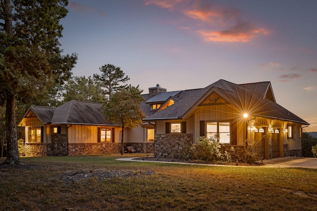 view of front of property with a yard