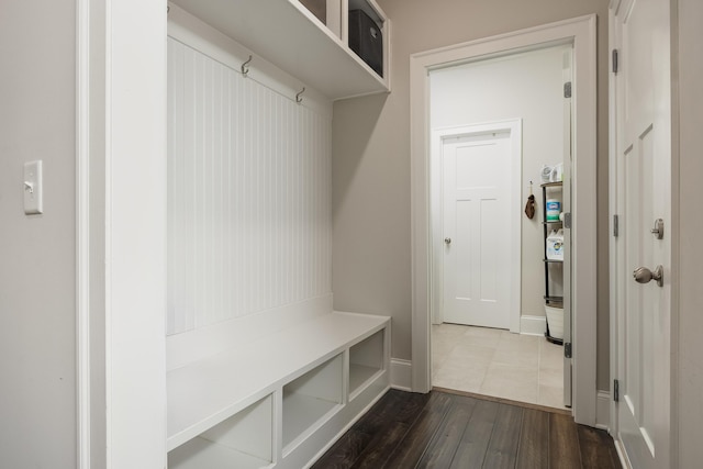 mudroom with dark wood-type flooring