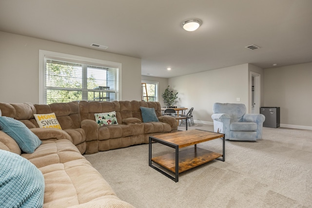 living room with light colored carpet