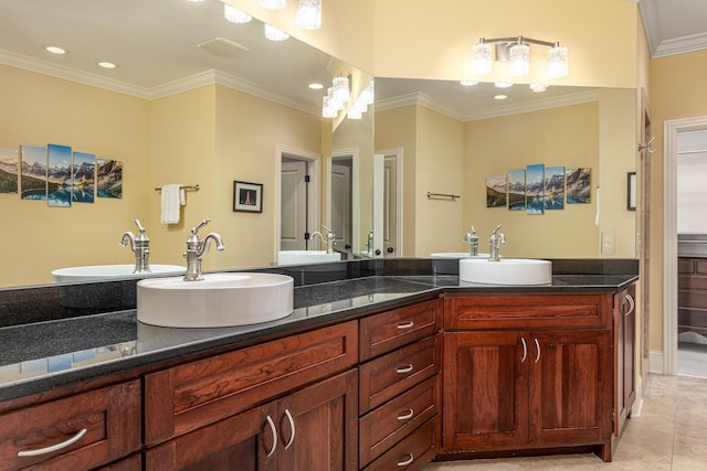 bathroom featuring vanity, crown molding, and tile patterned floors