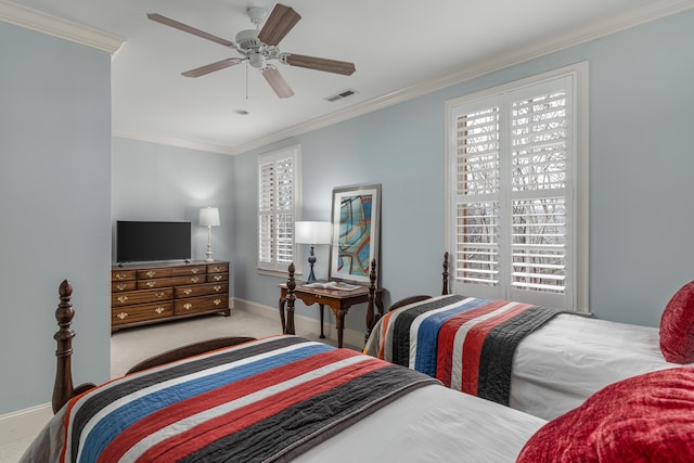 bedroom featuring ceiling fan, crown molding, and light carpet