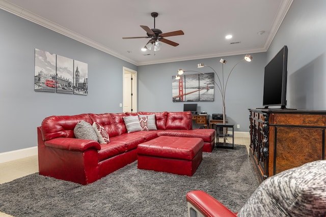 carpeted living room featuring ornamental molding and ceiling fan