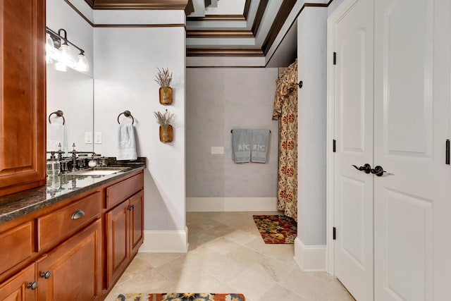 bathroom featuring vanity, curtained shower, and ornamental molding