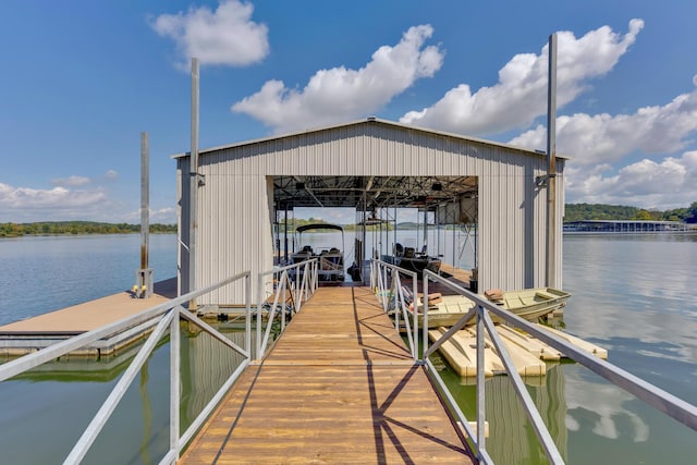 dock area with a water view