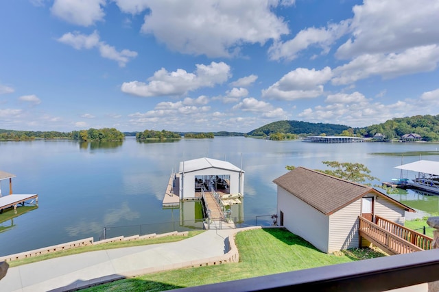 property view of water featuring a dock