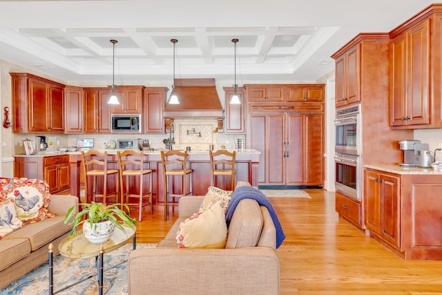 living room featuring coffered ceiling, beam ceiling, and light hardwood / wood-style floors