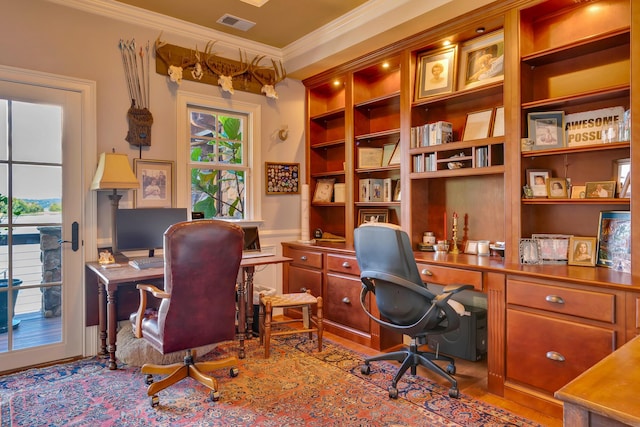 office space with ornamental molding