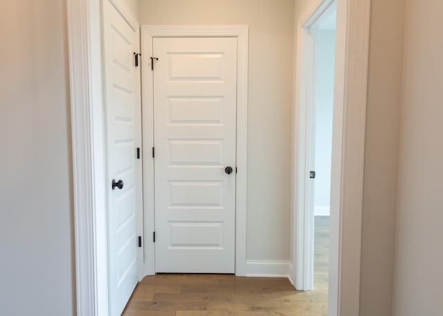 hallway featuring light wood-type flooring