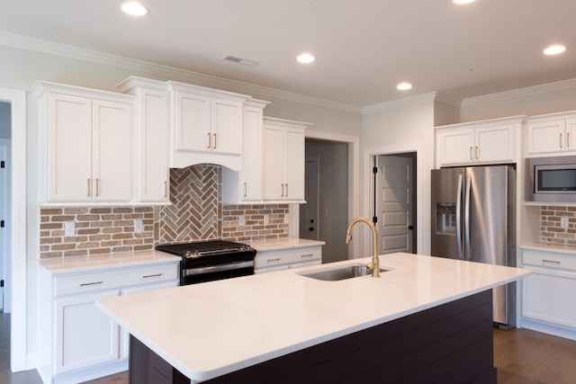 kitchen with white cabinetry, appliances with stainless steel finishes, and sink