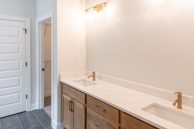 bathroom with vanity and tile patterned floors