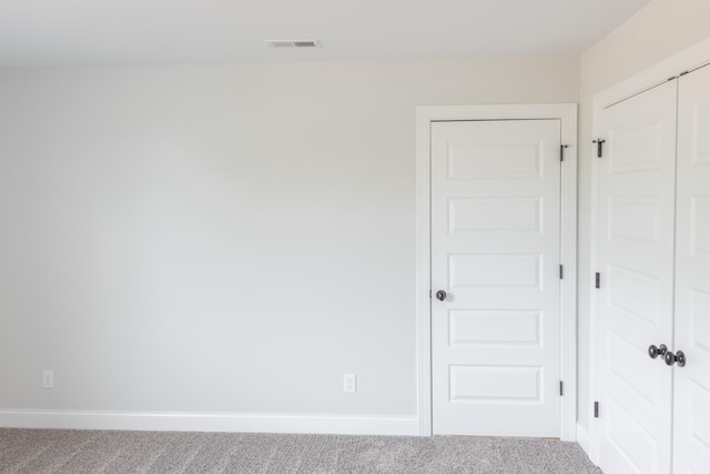 spare room with carpet flooring