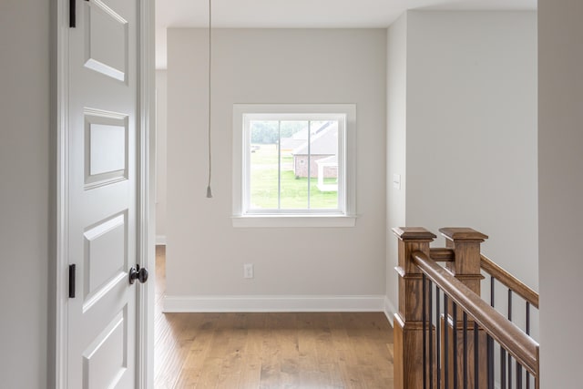 corridor featuring light hardwood / wood-style flooring