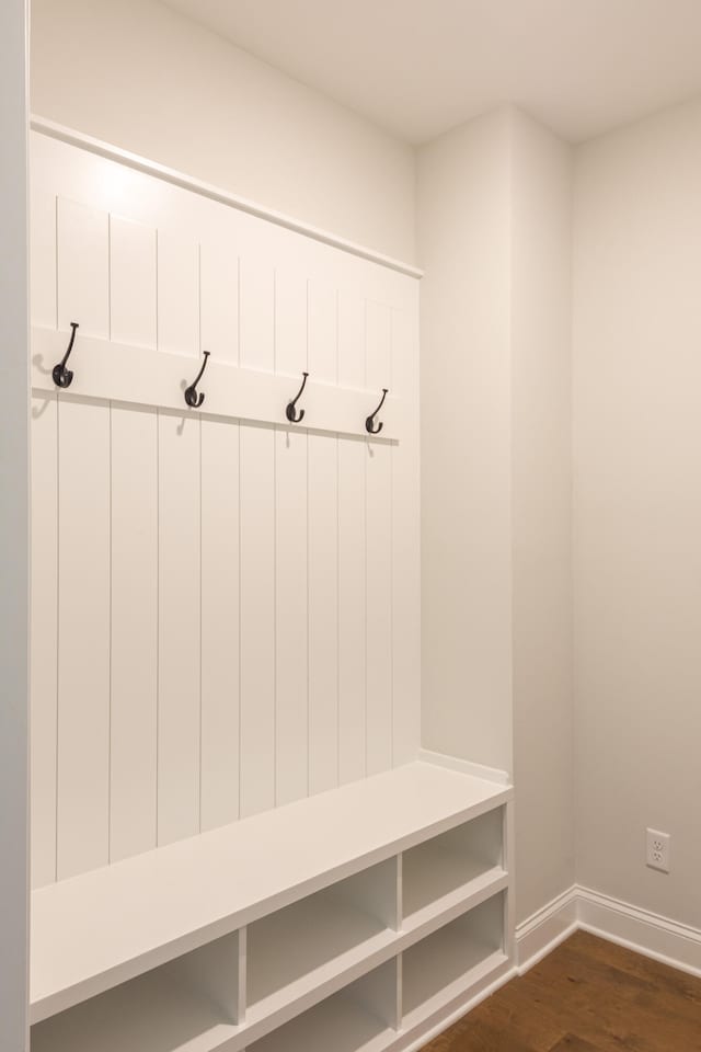 mudroom with dark hardwood / wood-style flooring