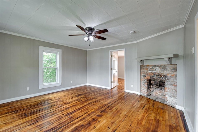 unfurnished living room featuring ceiling fan, hardwood / wood-style floors, and ornamental molding