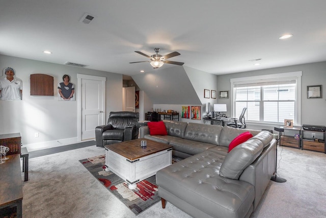 carpeted living room with ceiling fan