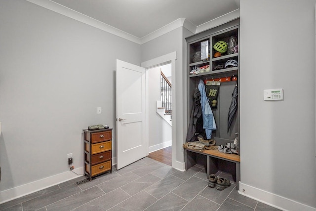 mudroom featuring ornamental molding