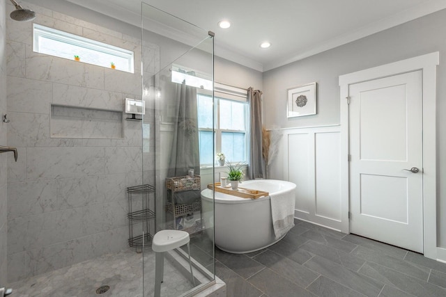 bathroom featuring crown molding and plus walk in shower