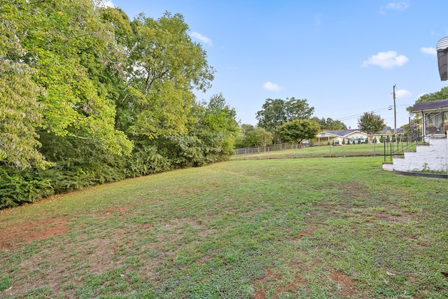 view of yard featuring a sunroom