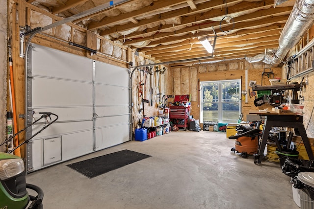 garage with a workshop area