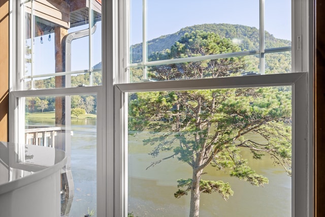 doorway with a water and mountain view