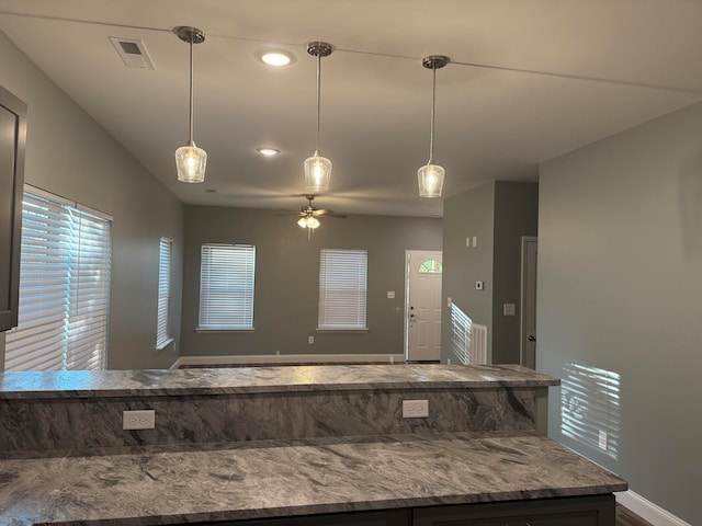 kitchen with decorative light fixtures and ceiling fan