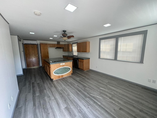 kitchen featuring dishwasher, ceiling fan, dark hardwood / wood-style floors, and sink