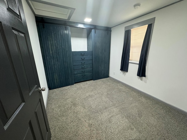 unfurnished bedroom with carpet