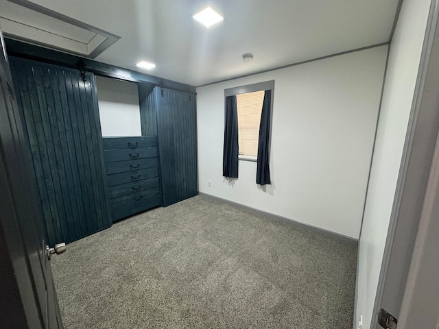 unfurnished bedroom with carpet flooring