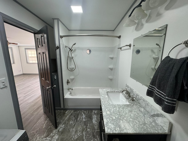 bathroom featuring hardwood / wood-style flooring, bathing tub / shower combination, and vanity