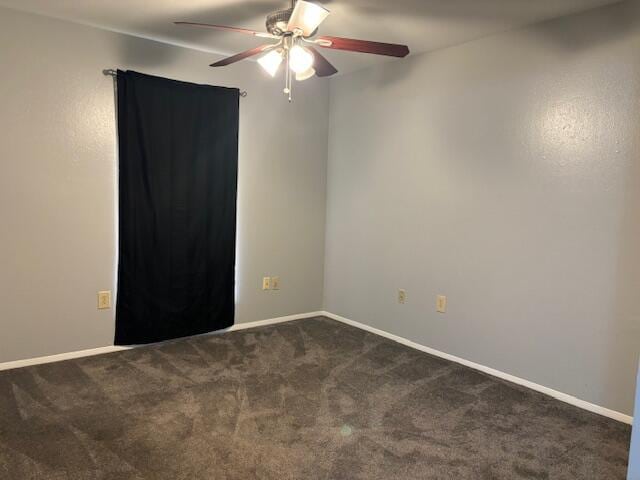 carpeted empty room with ceiling fan